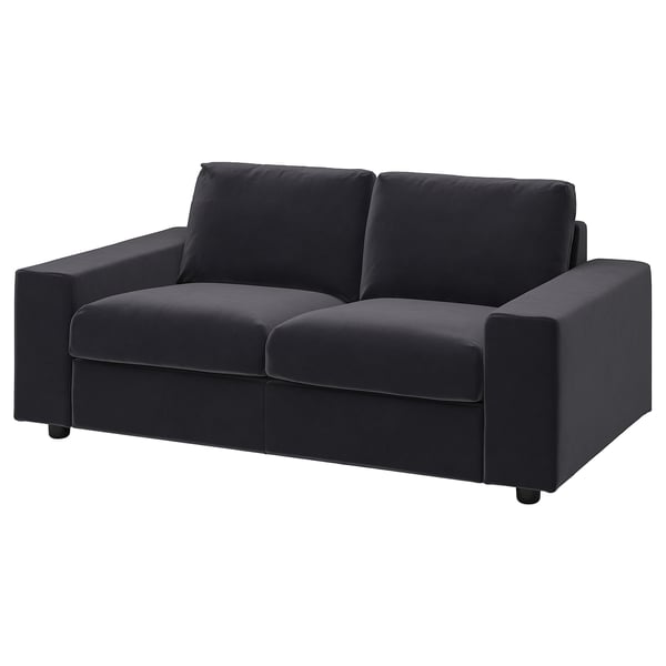En moderne, mørkegrå VIMLE sofa med et minimalistisk design, med dybe sæder og firkantede armlæn.