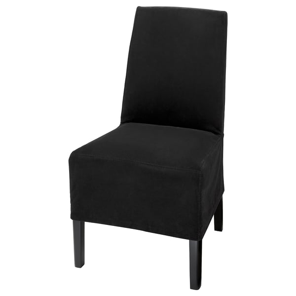 Black velvet chair, part of the BERGMUND series, featuring a sleek, backless design with metal legs. Comfortable with removable, washable cover.