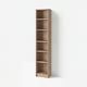 Tall, narrow wooden BILLY bookcase with six empty shelves against a wall.