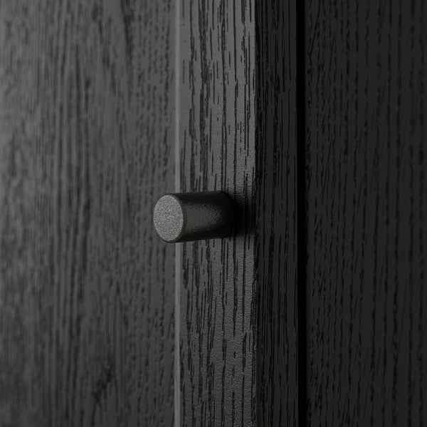 A close-up of a dark wood-grained door with a simple, cylindrical metal handle, showcasing its textured surface and high-quality finish.