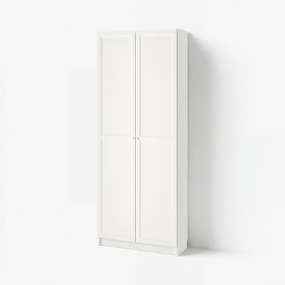 White BILLY bookcase, tall, rectangular, four doors, panels.