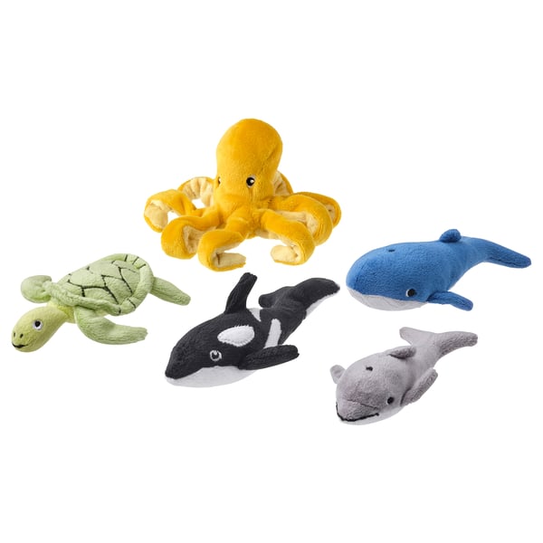 Five colourful ocean creature toys: yellow octopus, green turtle, blue whale, black-white orca, grey shark, made from soft recycled polyester.