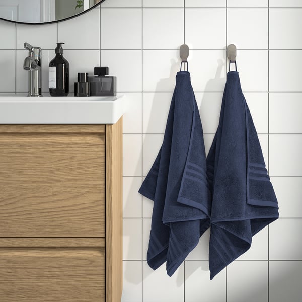 Towels & sink in modern bathroom