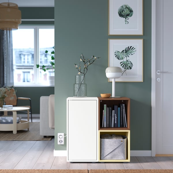 Minimalist living room with EKET storage, lamp.