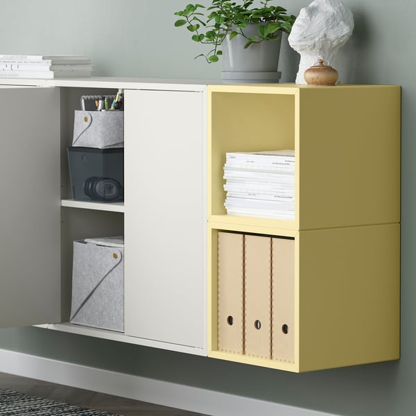 Wall-mounted storage units combine open and closed cabinets, featuring push-opener doors, adjustable shelves, and sleek design.