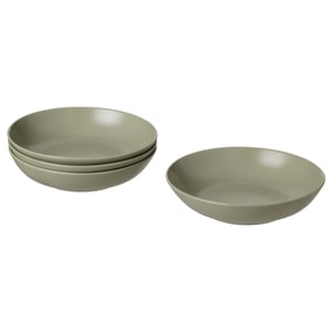 Four elegant, pale green FÄRGKLAR bowls, three stacked, one alone; simple, shallow design with smooth glaze, modern style.