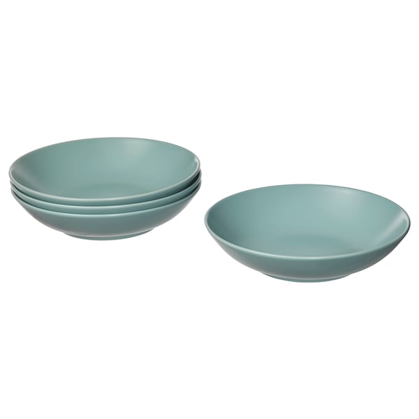 Four FÄRGKLAR green stoneware bowls, deep blue-green colour, simple design, stacked and separate.