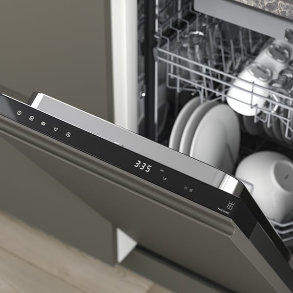 Modern built-in dishwasher displaying digital timer on control panel, showing clean dishes inside, with multiple racks and space-saving design.