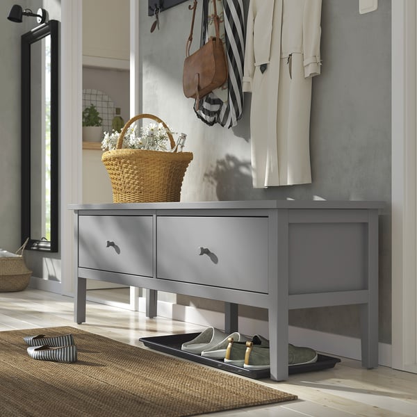 Grey gullberg bench with drawers & flowers.