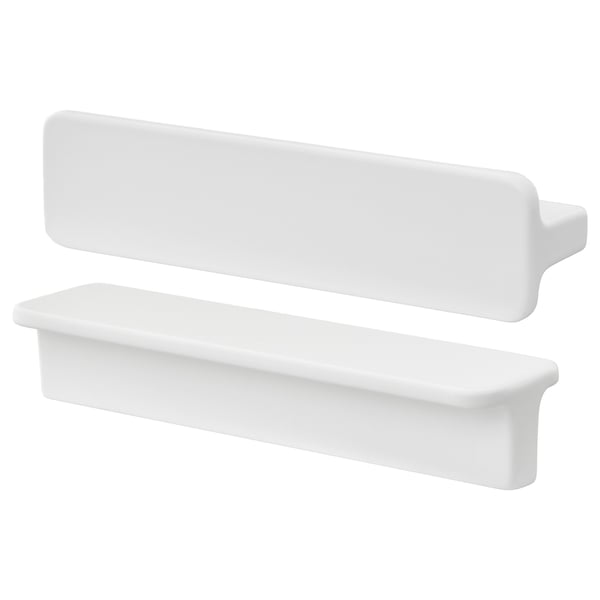 Two white HACKÅS handles, smooth and modern, displayed separately against a white background.