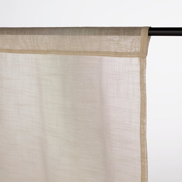 Sheer curtain on rod, pocket at back, lets light through, privacy, easy care.