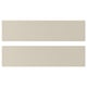 Two beige rectangular panels, smooth and modern, likely kitchen cabinet doors.
