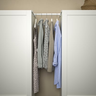 Closet with HJÄLPA rail hanging shirts, showing organisation and adjustable storage.