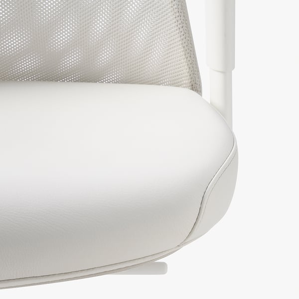 Ergonomic office chair detail. Cushioned seat, mesh back, and adjustable lumbar support for comfort and support.
