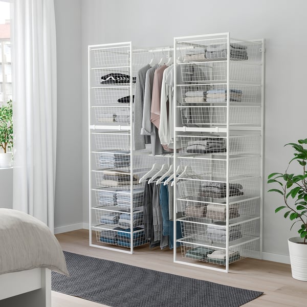 JONAXEL white metal closet organiser with shelves & rail in bedroom.