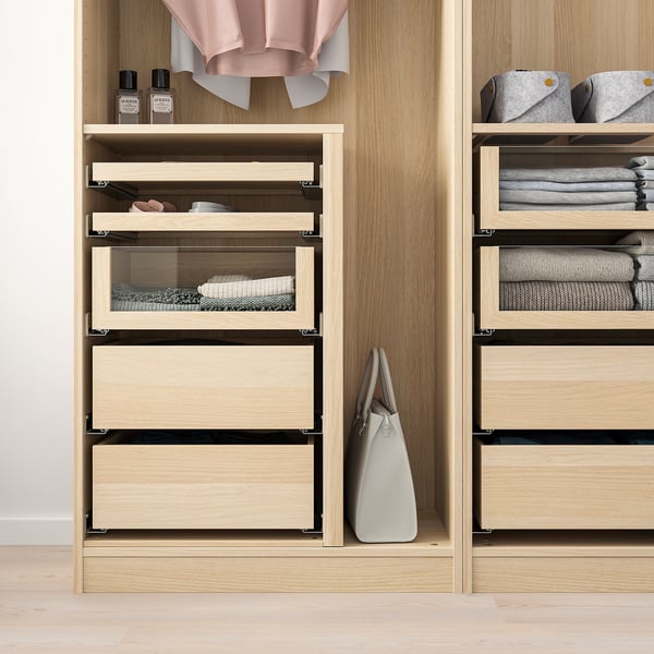 Wooden closet with glass drawers, organised clothes, slow-close