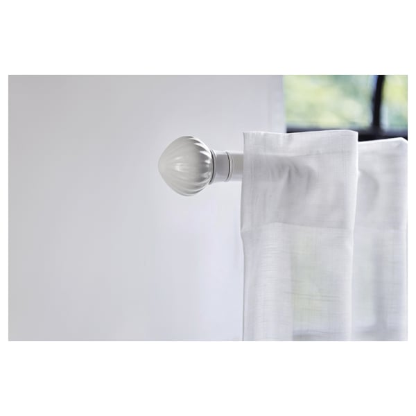 LERBRONIA white ceramic finial on curtain rod, elegant and round, attached to white curtain.