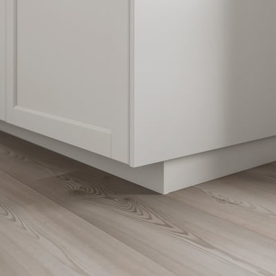 White kitchen plinth covering floor gap, part of LERHYTTAN series, fits metod cabinets.