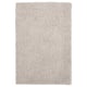 Soft beige LINDKNUD rug. Rectangular, plush texture from recycled polyester. Ideal for bedrooms.
