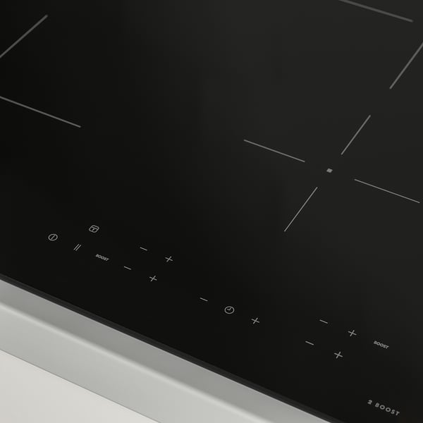 High-end black induction hob with four heating zones and touch controls. Boost functionality and child lock for safety.