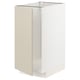 A white and beige METOD kitchen cabinet with sleek, smooth surfaces and modern design.