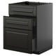 Modern black kitchen unit with sleek, beveled edges and multiple drawers.