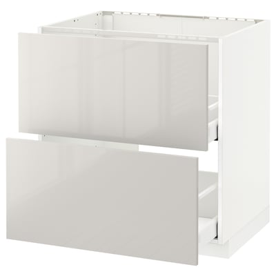 White METOD kitchen unit with drawers, modern, glossy, clean lines.