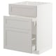 White METOD kitchen unit with bevelled light grey lerhyttan drawer fronts.