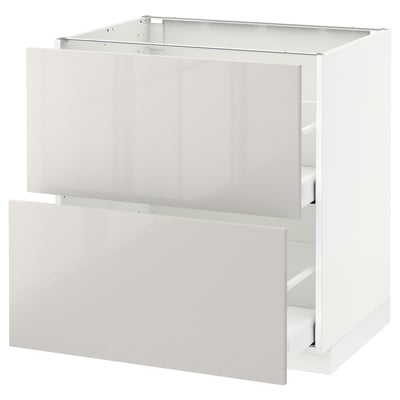 White METOD kitchen cabinet with smooth shiny surface.