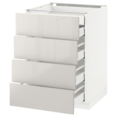 A white, modern kitchen cabinet unit with four open drawers, featuring a contemporary design.