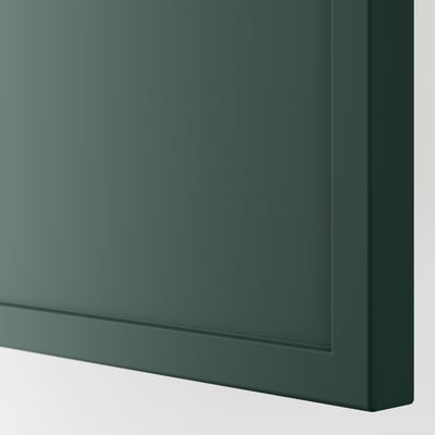 Dark green kitchen cabinet with smooth, sturdy finish. Clean lines and high-quality construction.
