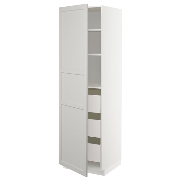 White METOD kitchen cabinet with open door, bevelled edges.
