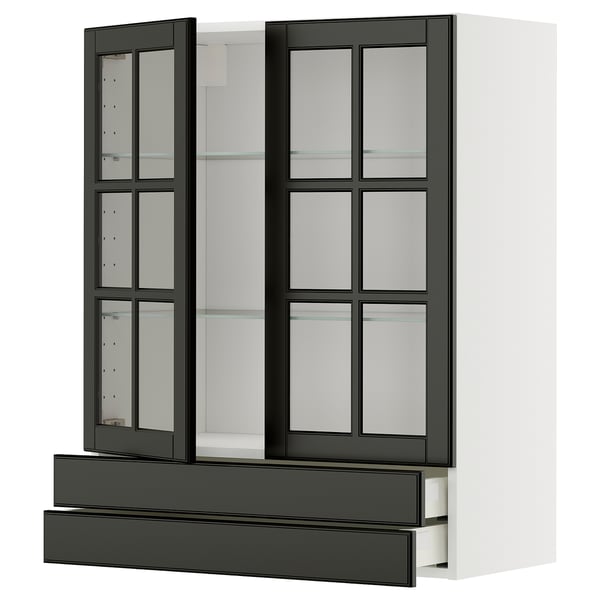 Modern black glass-front kitchen cabinet, part of the METOD system, featuring sleek beveled edges and multiple adjustable shelves.