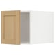 Wooden cabinet door open, revealing box. Classical design, natural wood look.