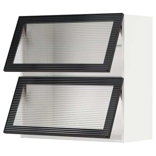 Modern kitchen cabinets with glass doors, sleek black frames, and reeded glass panels, arranged in a modular style.