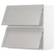 A light grey METOD kitchen cabinet with a traditional design. It two rectangular doors with bevelled edges and a sturdy frame.