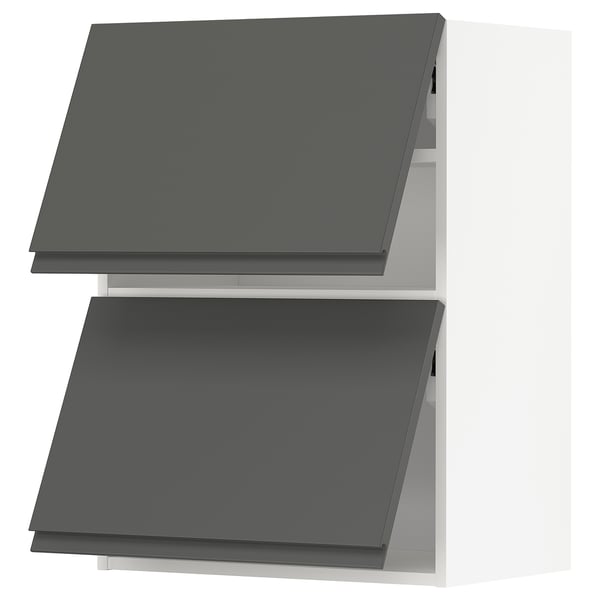Two dark grey, modern kitchen cabinets with sleek handles and recessed panels. They are part of the METOD system.