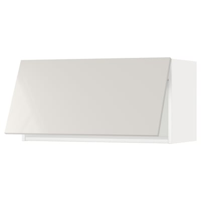 A modern, rectangular METOD kitchen cabinet in white with a sleek, glossy finish and clean lines.