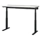 The MITTZON sit-stand desk is sleek, black, and height-adjustable. It a white top and sturdy legs, promoting ergonomic comfort.