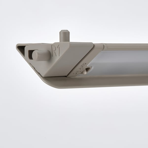 Close-up of led light strips sleek, high-quality metal housing with embedded sensors, designed for wardrobe illumination.