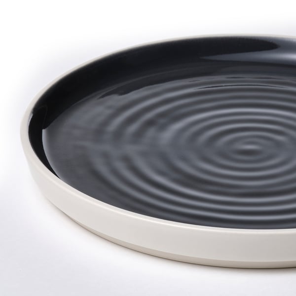 Black swirl plate, white rim