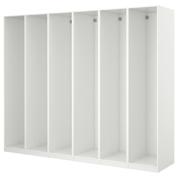 A white PAX wardrobe unit with multiple empty compartments.