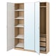 A PAX wardrobe in light wood with mirrors and metal shelves. Its tall, narrow, and organised with shelves and drawers.