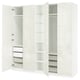 White IKEA PAX wardrobe with shelves, drawers, and mesh baskets.