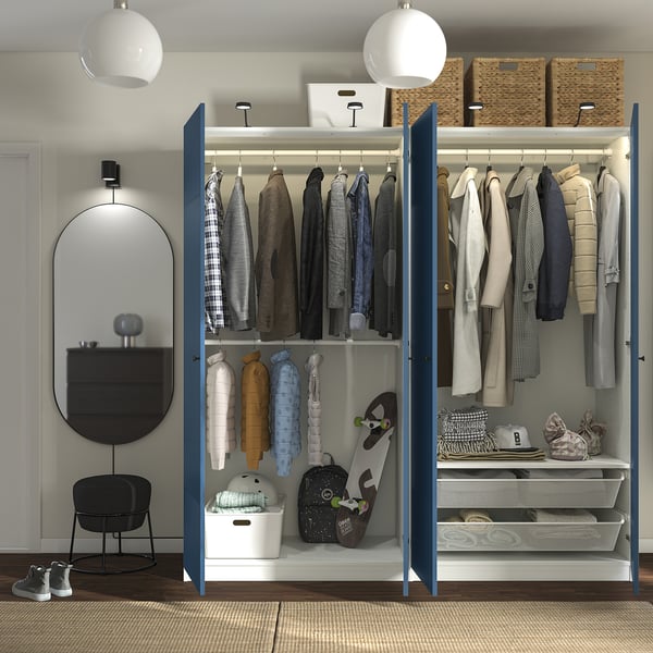 Organised clothing storage with hanging garments, shelves, and baskets. Includes lighting and adjustable.
