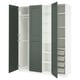 An open PAX wardrobe in green, featuring shelves and drawers, offering organised storage space.