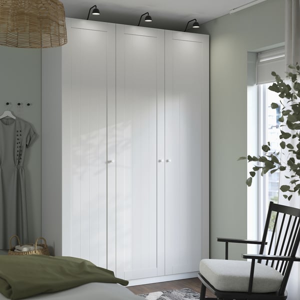 Modern bedroom with PAX wardrobe & led lights.