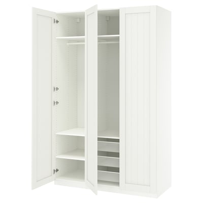 Displays a white ikea PAX wardrobe with double doors open, revealing multiple shelves and a mesh basket inside.