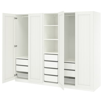 White PAX wardrobe with shelves, drawers, and rail, sleek and modern.