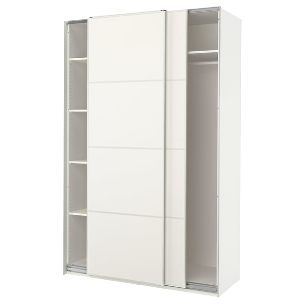 A white ikea PAX wardrobe with sliding doors and shelves.
